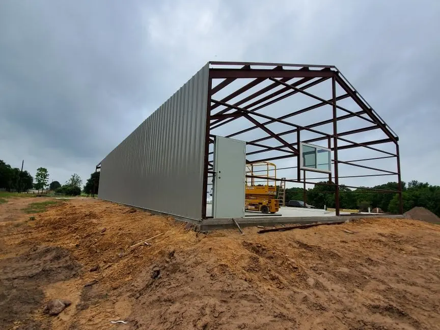 Steel frame with wall panels going up