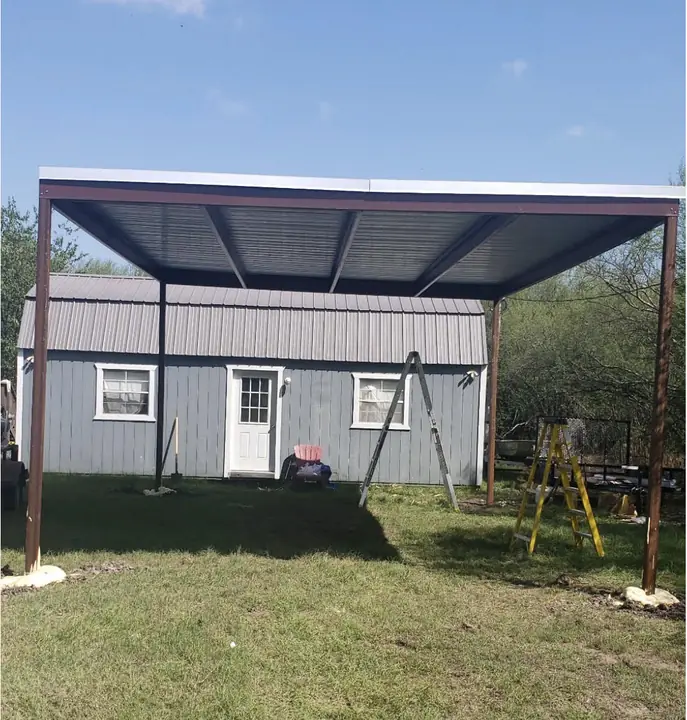 Tall carport built over a storage shed