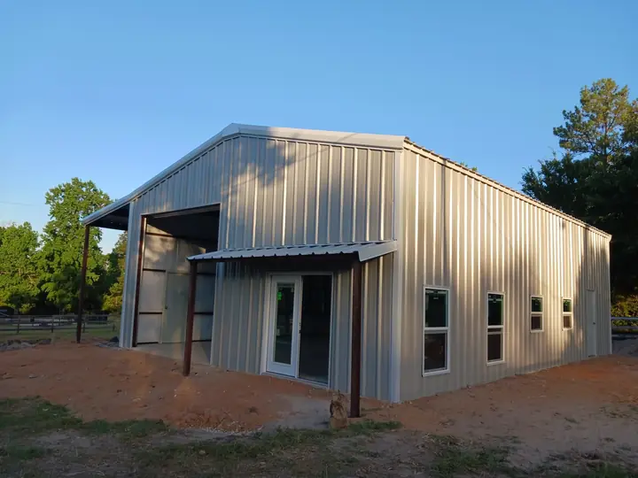 Gray building with porch awnings and windows