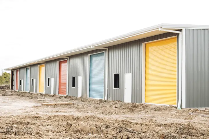 Self-storage building with colored roll-up doors