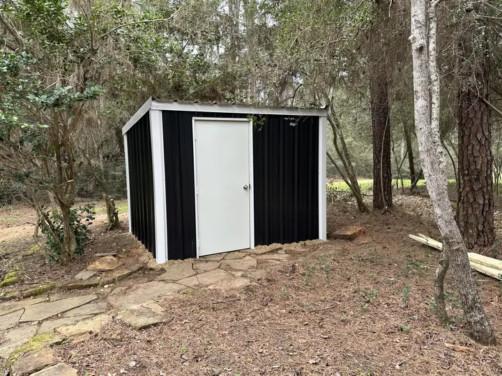 Black and white well house
